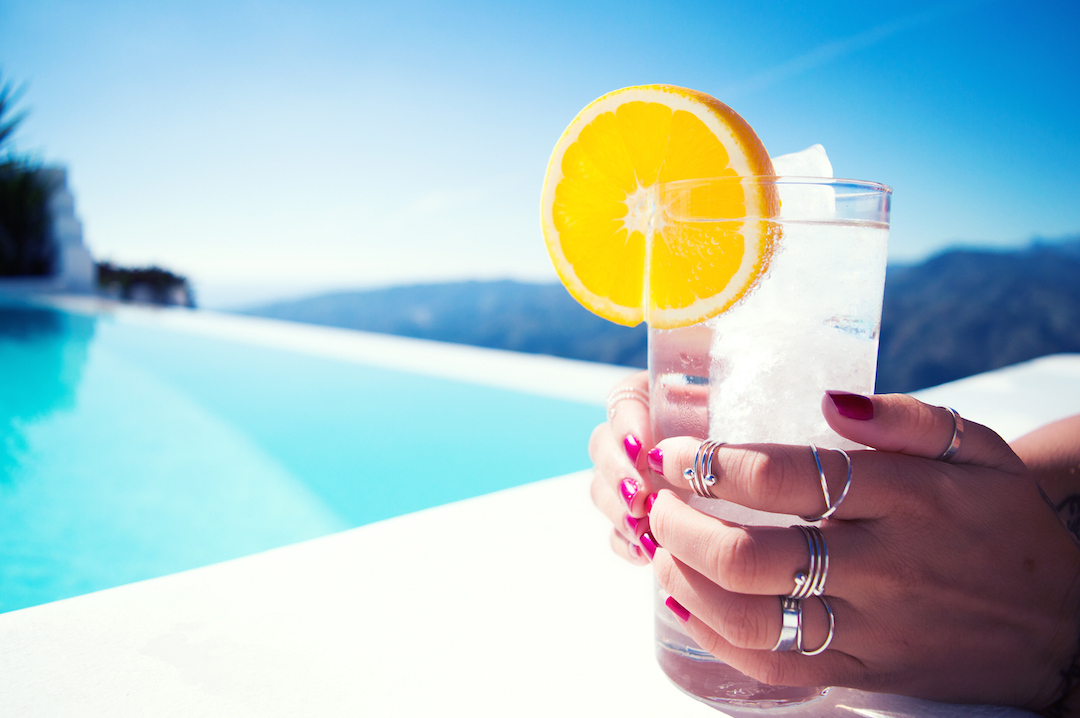 Spain-holiday-CasaMiranda-pool-view-enjoy-sparklingwater-orange